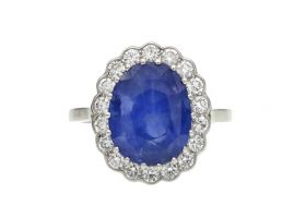 10ct Ceylon sapphire and diamond oval cluster ring in platinum