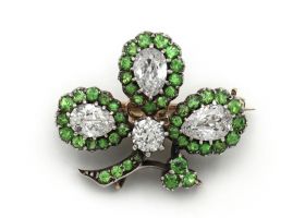 Antique shamrock brooch set with diamonds and demantoid garnets