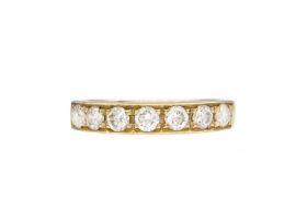 Contemporary diamond set half eternity ring in 18kt yellow gold
