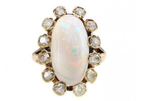 Antique oval opal and diamond cluster ring in yellow gold