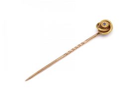 Antique sapphire and yellow gold knot stickpin
