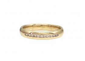 18kt yellow gold and diamond channel set half eternity ring