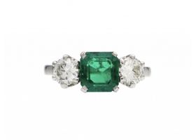 Colombian emerald and diamond three stone ring in platinum