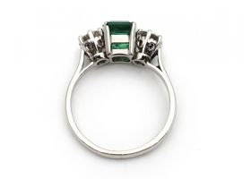 Colombian emerald and diamond three stone ring in platinum