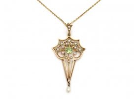Antique peridot and seed pearl pendant in yellow gold
