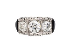Art Deco diamond and onyx three stone ring in platinum