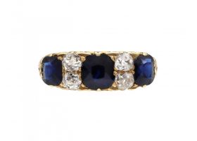 Antique sapphire and diamond carved ring in 18kt yellow gold
