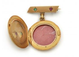 Antique emerald and ruby circular locket brooch in gold