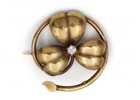 Antique diamond set shamrock brooch in yellow gold