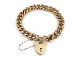 Vintage 9kt yellow gold curb link bracelet with heart lock