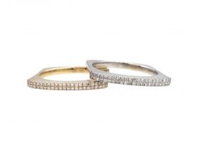 Two diamond set 18kt yellow and white gold stacking rings