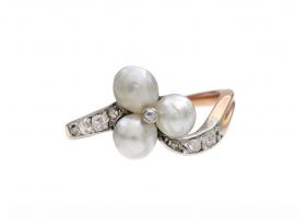 Edwardian three stone pearl and diamond twist ring in platinum on gold