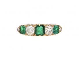 Victorian emerald and diamond five stone carved ring in 18kt yellow gold