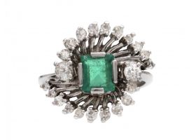Modern emerald and diamond flaring fancy cluster ring