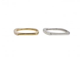 Two diamond set 18kt yellow and white gold stacking rings