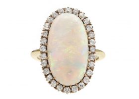 Edwardian oval opal and diamond cluster ring in 18kt yellow gold