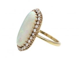 Edwardian oval opal and diamond cluster ring in 18kt yellow gold