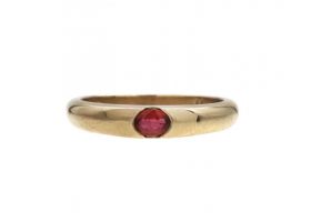 Modern 9kt yellow gold and oval ruby stacking ring