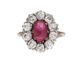 Edwardian oval Burmese cabochon and diamond cluster ring