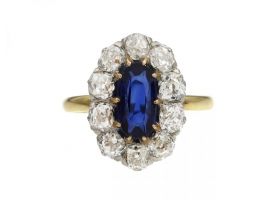Antique elongated oval sapphire and diamond coronet cluster ring
