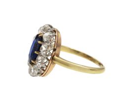 Antique elongated oval sapphire and diamond coronet cluster ring