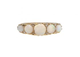 Edwardian opal five stone opal five stone ring in 18kt yellow gold