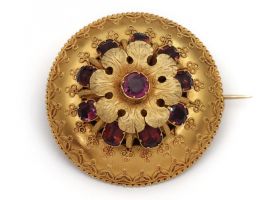 Antique Etruscan revival garnet set flower brooch in 18kt gold