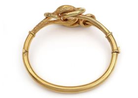 Antique hollow gold knot hinged bangle in 18kt yellow gold