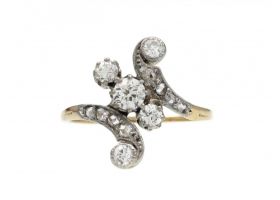 Edwardian diamond three stone twist ring in platinum and 18kt gold