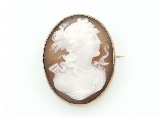 Antique shell cameo of a woman's profile brooch