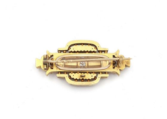 Etruscan revival 15kt yellow gold and diamond brooch