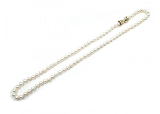 Vintage cultured pearl necklace with a yellow gold bow clasp