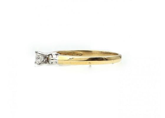 18kt yellow gold flanked diamond solitaire engagement ring