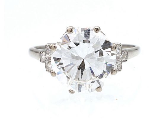 Edwardian 3.98ct diamond solitaire ring with diamond set shoulders