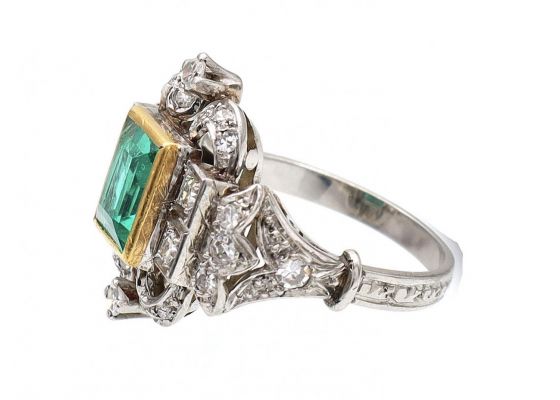 Art Deco emerald and diamond cluster ring in gold and platinum