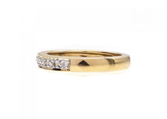 Diamond illusion set half eternity ring in 18kt yellow gold