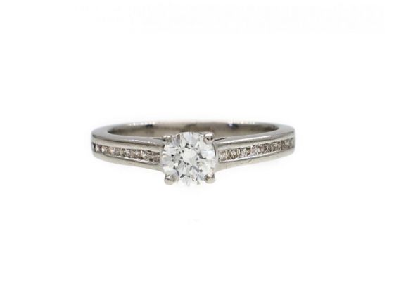 0.41ct round brilliant cut diamond flanked solitaire ring