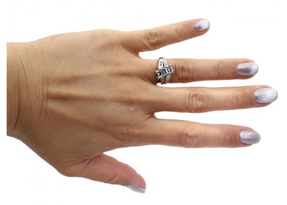Art Deco Rectangular Step Cut Diamond Three Stone Twist Ring in Platinum