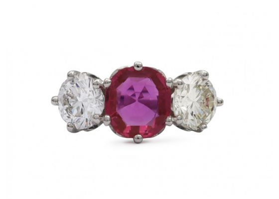 Vintage fancy pink sapphire and diamond three stone engagement ring