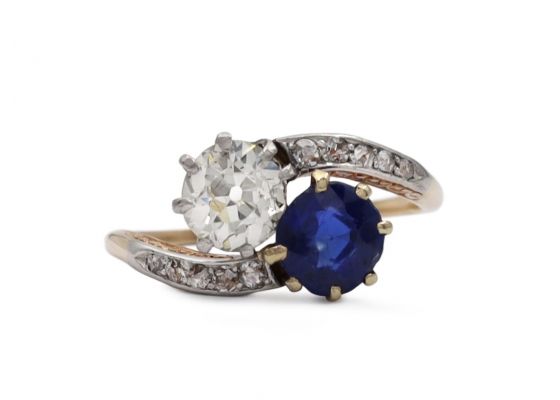 Edwardian sapphire and diamond two stone twist ring in gold