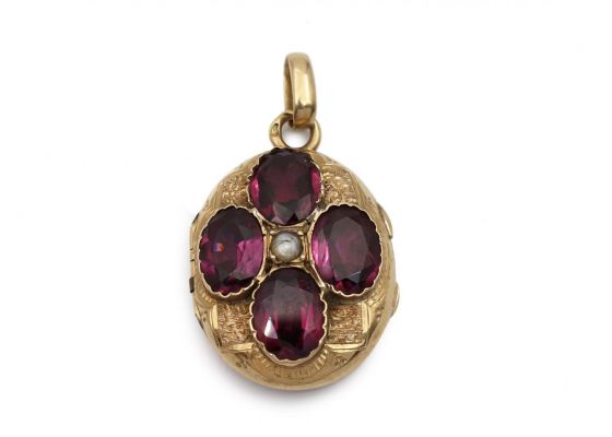 Antique French seed pearl and garnet oval locket in 18kt yellow gold