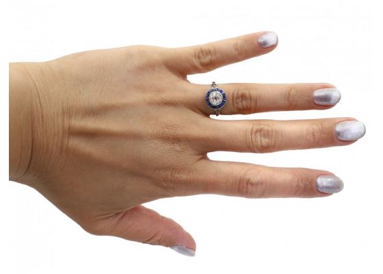 French Art Deco diamond and sapphire target engagement ring in platinum