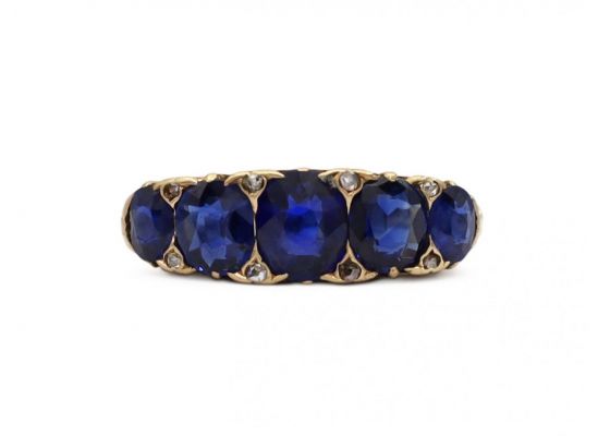 Victorian sapphire five stone carved ring in 18kt yellow gold