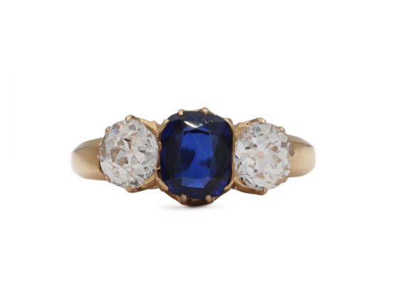 Antique sapphire and diamond three stone engagement ring