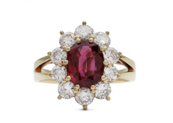Ruby and diamond coronet cluster engagement ring in gold