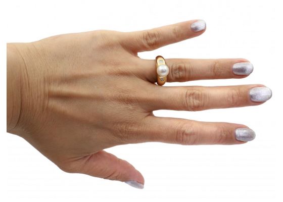 Vintage cultured pearl and diamond solitaire ring in gold