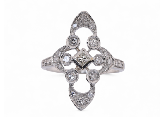 Vintage geometric diamond panel ring in platinum with princess cut centre